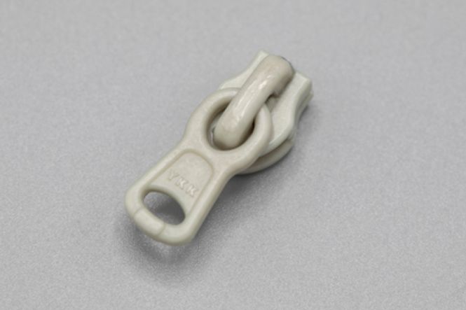 Hovedbilde GLIDELÅSSKYVER SPIRAL 4 MM PLAST LYS GRÅ